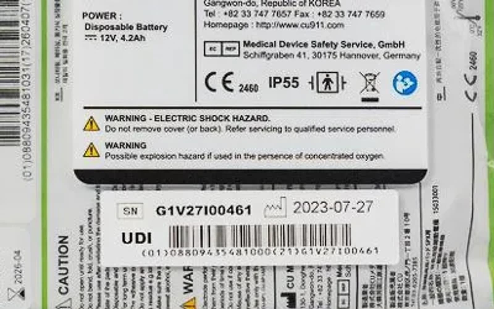 Etykieta defibrylatora CU Medical iPAD SP1: znak CE z numerem 2460, klasa IP55, dane producenta i przedstawiciela w UE