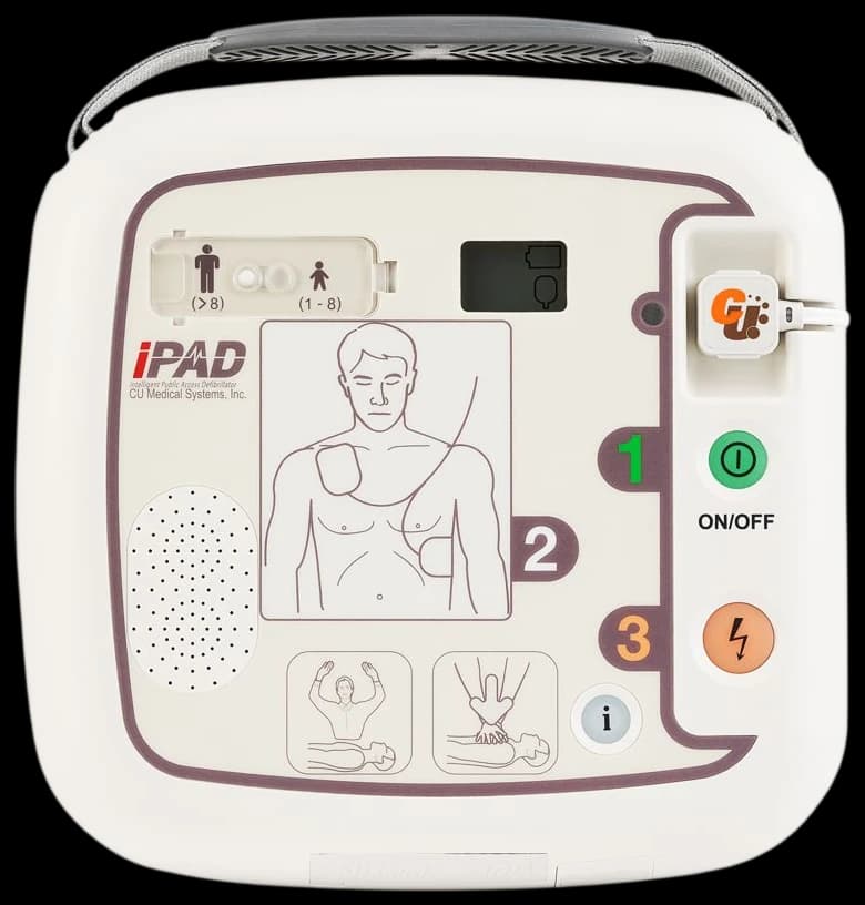Panel czołowy defibrylatora CU Medical iPAD SP1: przełącznik dorosły/dziecko, piktogramy naklejania elektrod, przyciski włączania i wstrząsu